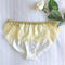 Golden amulet hip hanger shorts