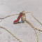 heel necklace