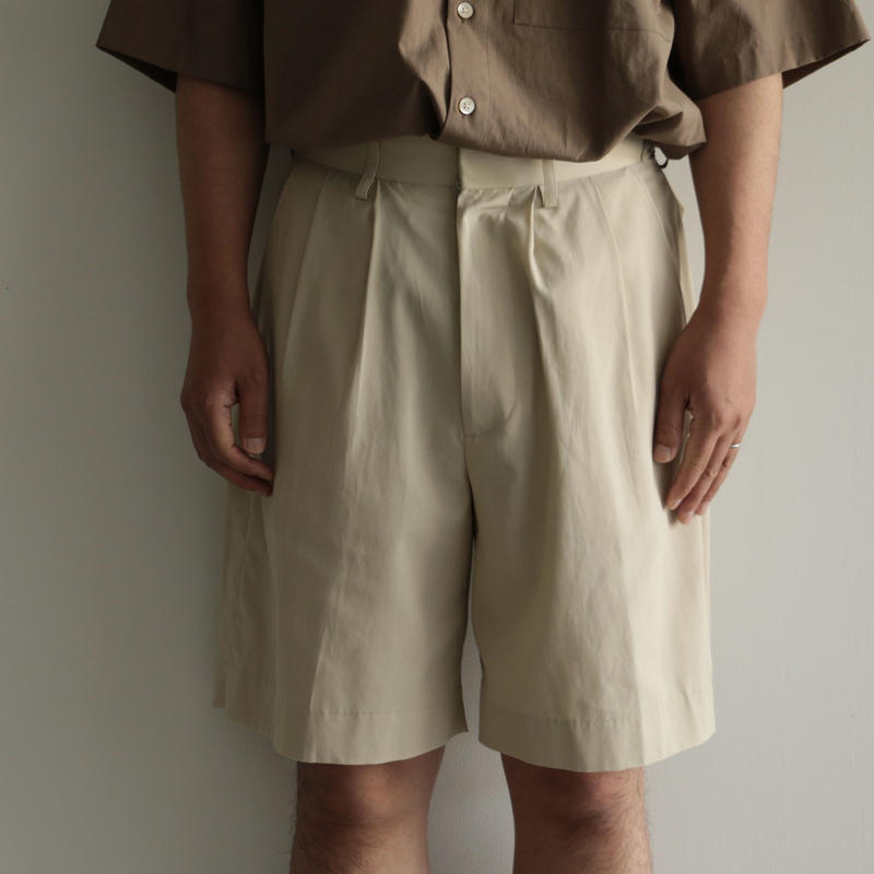 high twist gabardine three tuck shorts