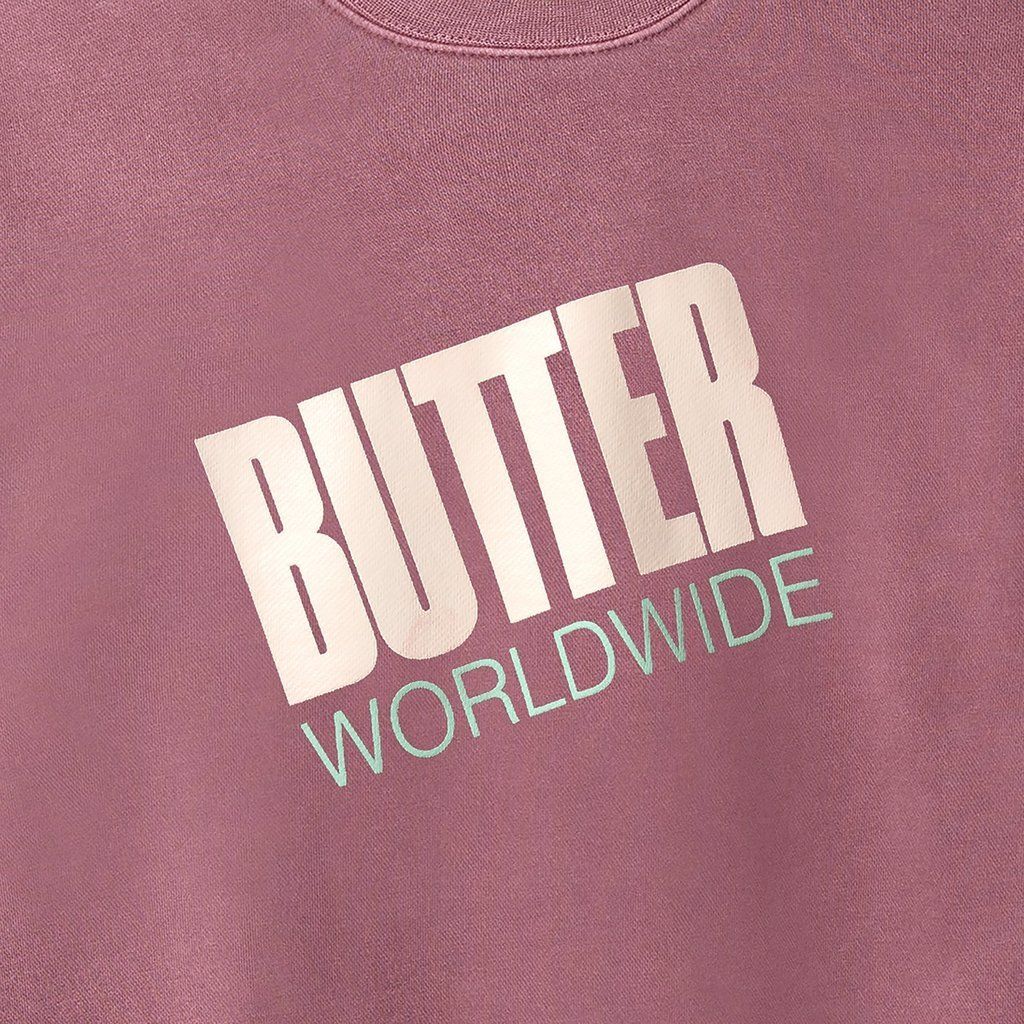 BUTTER GOODS TILT LOGO CREWNECK PIGMENT MAROON...
