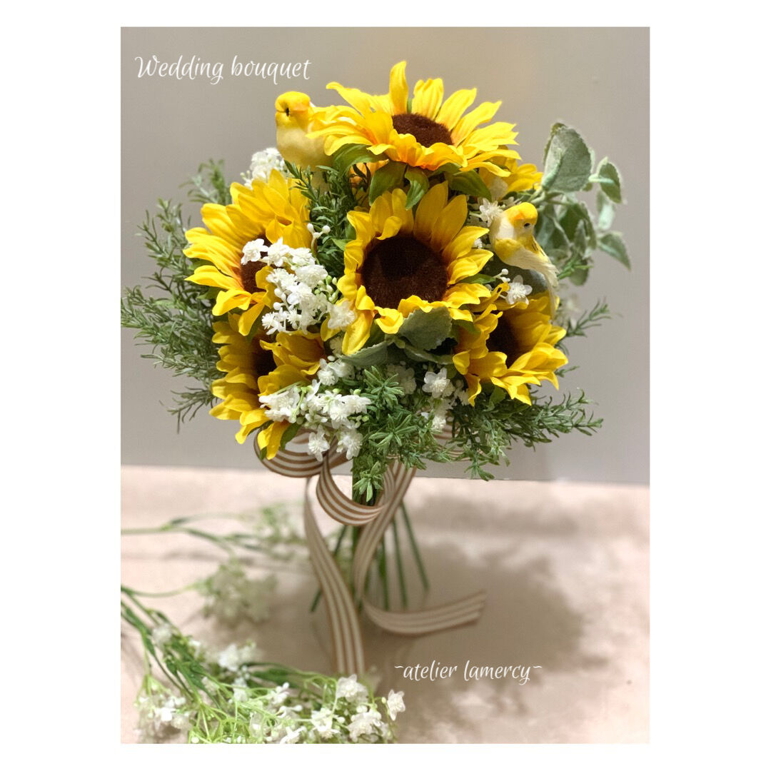 ひまわりのクラッチブーケ Atelier Lamercy ひまわりのクラッチブーケ Atelier Lamercy