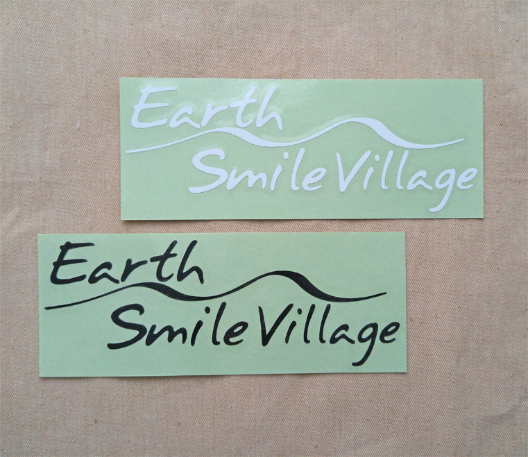 ステッカー Earth Smile Villageロゴ 文字抜き Nomadica