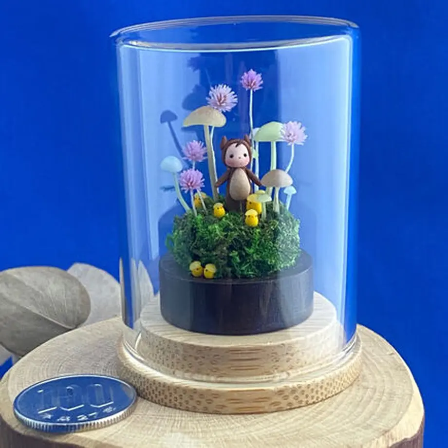 Puco Child squirrel and chick ornament