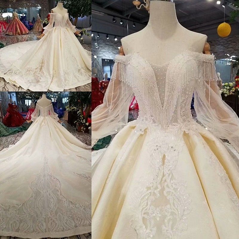 ウエディングドレス プリンセスライン オフショルダー シースルー袖 エレガント 華やかなトレー