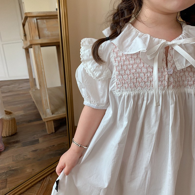 即納 パフスリーブの白の清楚スモッキングワンピース Moka